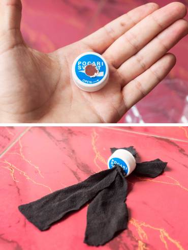 Now burn a hole into the bottle cap. Pull the cotton strips through the cap.